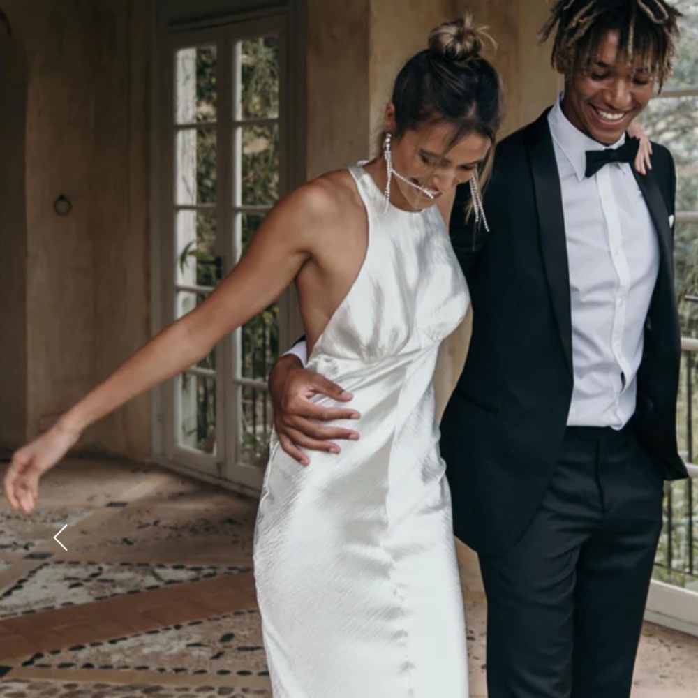 NEW Pearlescent ivory, textured satin, high neck wedding dress with racer back.